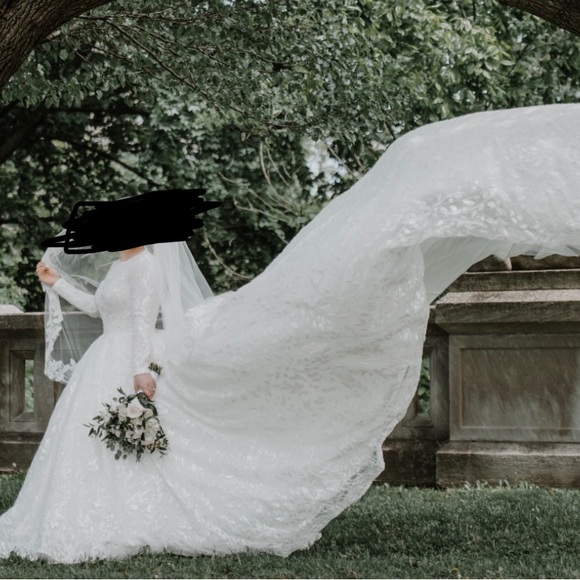 Custom made wedding dress, size 8 bought for $6000, selling for $3000 OBO. - Picture 2 of 3